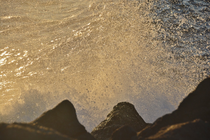 water spray against rocks